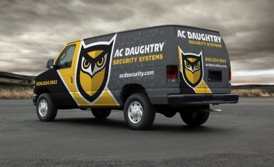 Vehicle wrap design for A.C. Daughtry Security Systems, a security company providing integrated home and business security solutions throughout New Jersey.